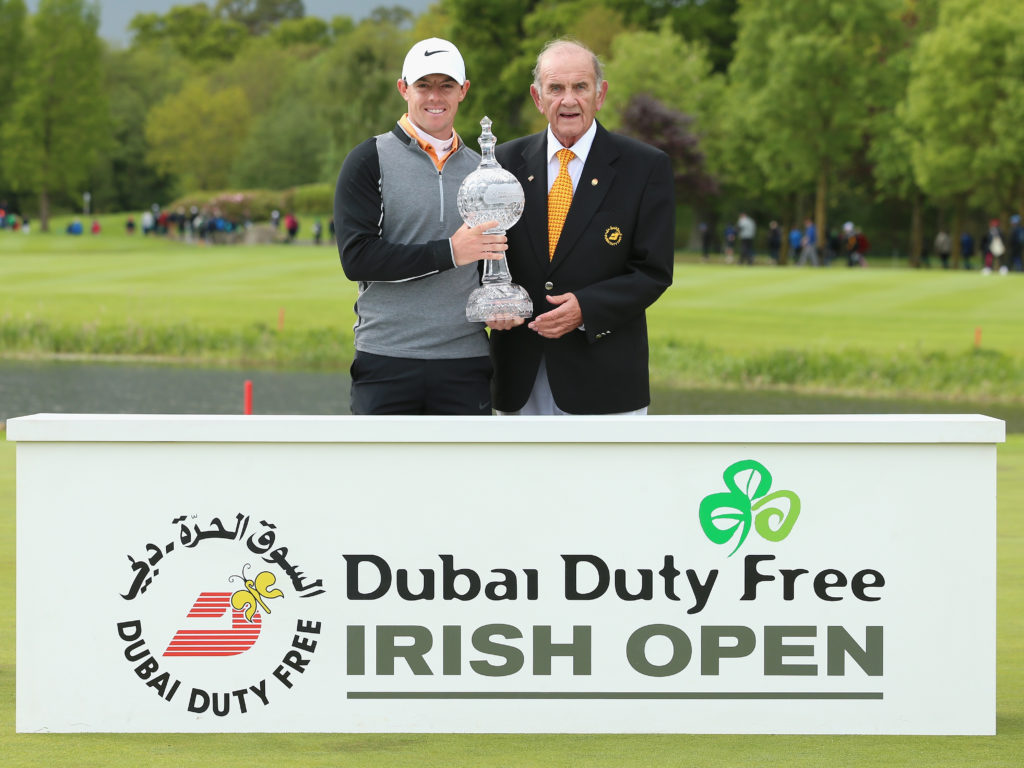 STRAFFAN, IRELAND - MAY 22: Rory McIlroy of Northern Ireland poses with the trophy with Colm McLoughlin, the Executive Vice Chairman of Dubai Duty Free, after winning the Dubai Duty Free Irish Open Hosted by the Rory Foundation at The K Club on May 22, 2016 in Straffan, Ireland. (Photo by Andrew Redington/Getty Images)